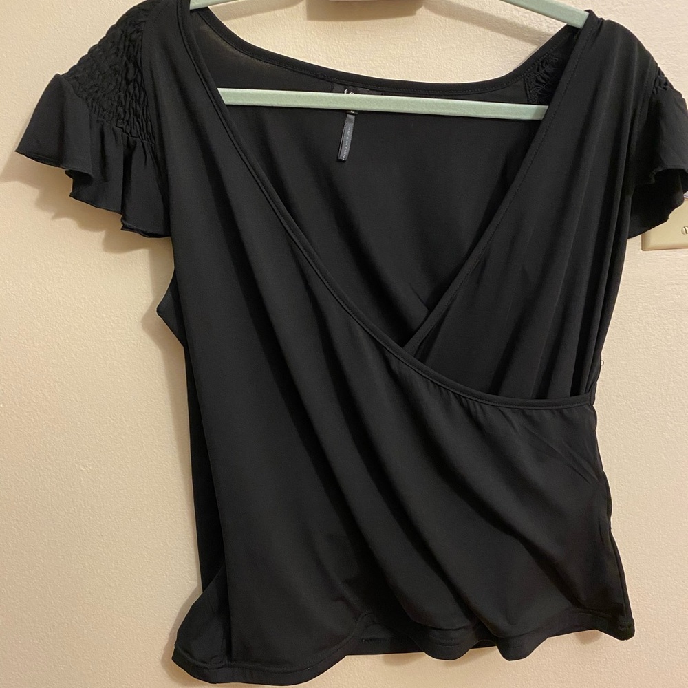 Casual black tee with deep v plunge neckline